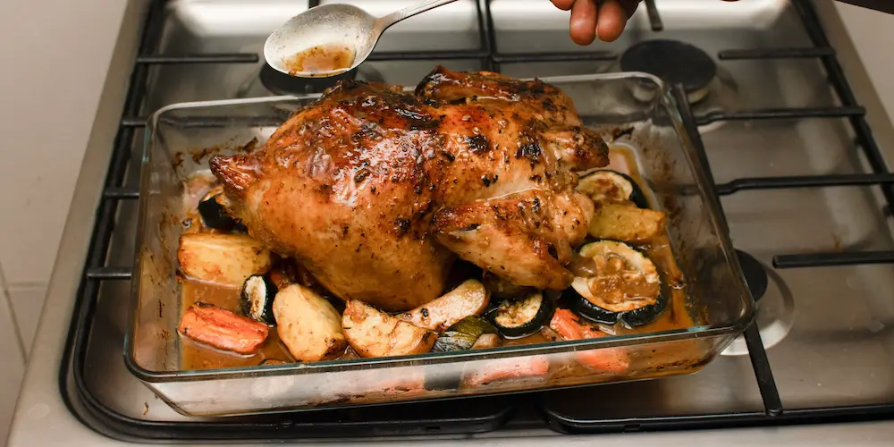 Golden crispy chicken skin on a roasted whole bird